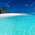 depositphotos_8286530-stock-photo-palm-trees-over-stunning-lagoon